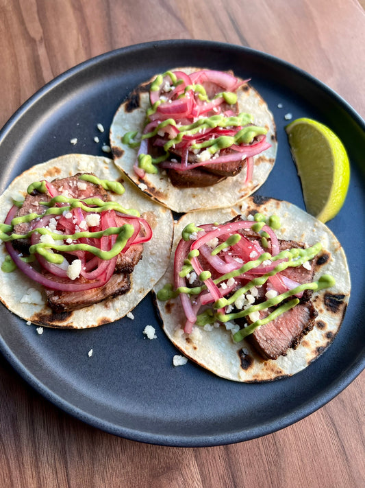 Filet Mignon Tacos with Avocado Crema & Pickled Red Onions