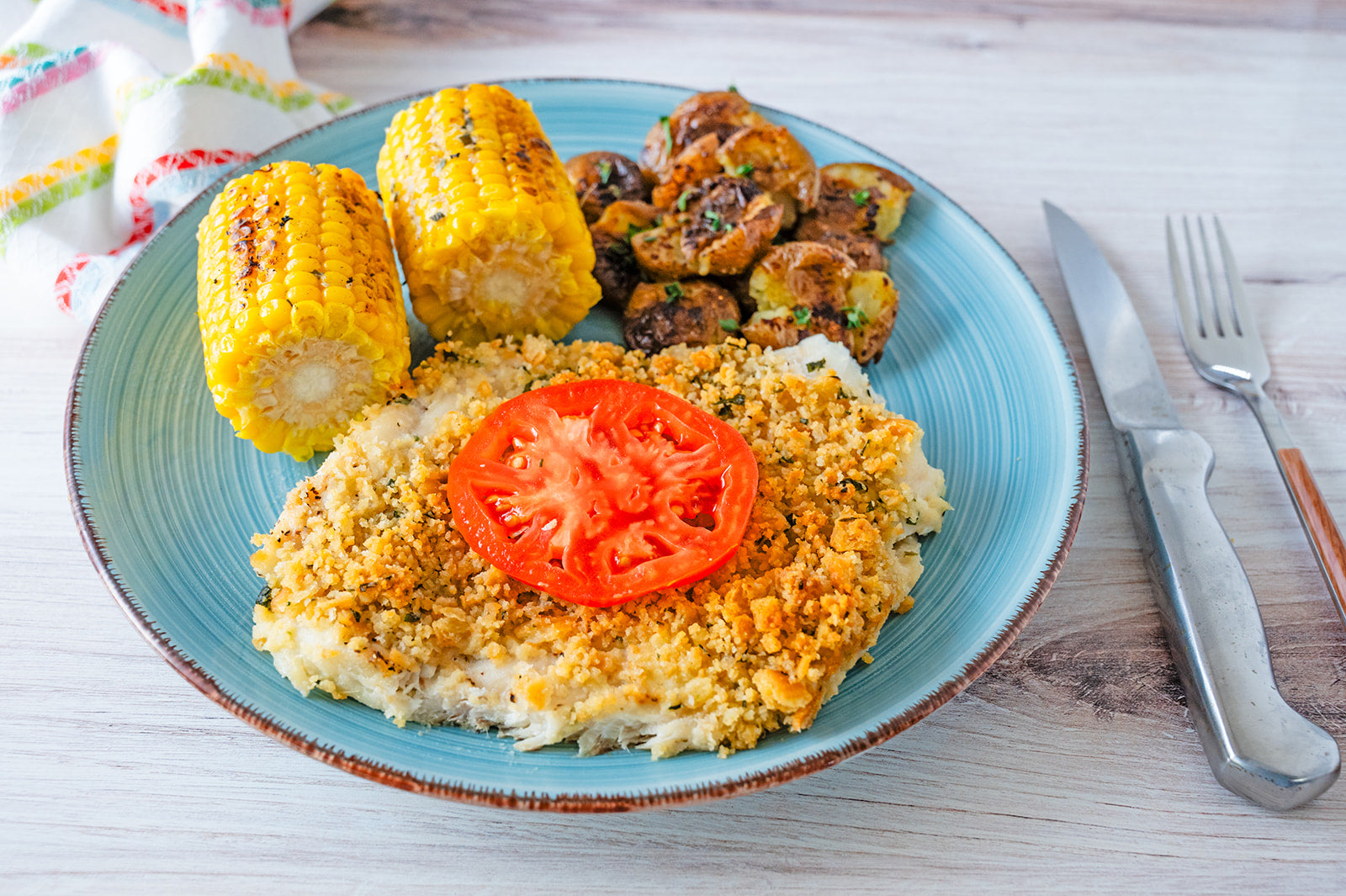 New England baked haddock with corn and mushrooms